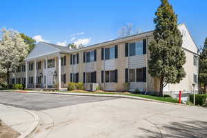 View of property with central AC