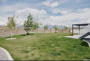 View of yard with a mountain view