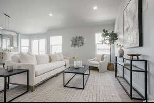 Living room featuring plenty of natural light and light wood-type flooring