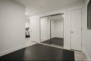 Interior space featuring a closet and light hardwood / wood-style flooring