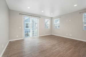 Unfurnished room featuring a wealth of natural light and light hardwood / wood-style flooring