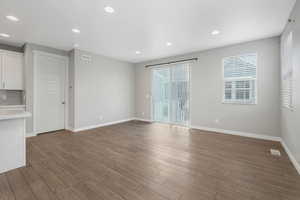 Unfurnished living room with wood-type flooring