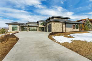 Prairie-style home with a garage