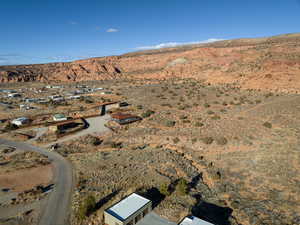 Birds eye view of property with a mountain view