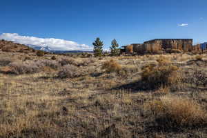 Property view of mountains with a rural view