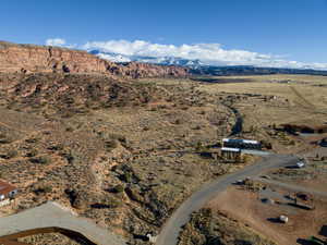 Birds eye view of property with a mountain view