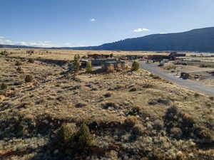 Property view of mountains with a rural view