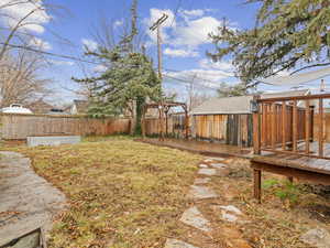 View of yard featuring a deck