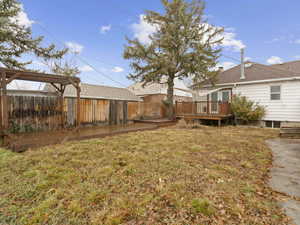 View of yard with a deck