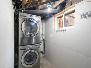 Laundry area with stacked washer / dryer