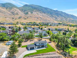 Birds eye view of property with a mountain view