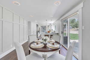 Dining area featuring dark hardwood / wood-style floors