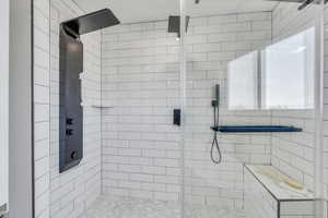 Bathroom featuring a shower with shower door