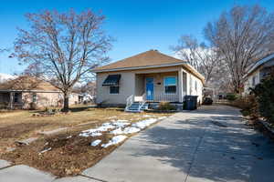 Bungalow featuring a porch