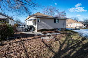 Rear view of property with a patio area