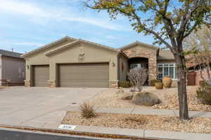 Single story home featuring a garage