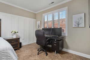 Home office with ornamental molding