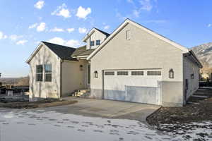 View of front of property with a garage