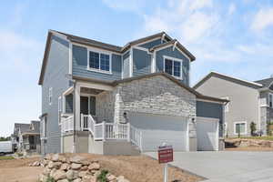 Craftsman-style house with a garage