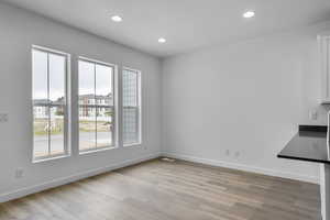 Interior space featuring light hardwood / wood-style floors and a wealth of natural light