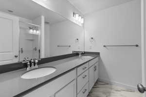 Bathroom with vanity and walk in shower