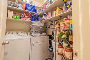 Laundry room featuring washing machine and dryer