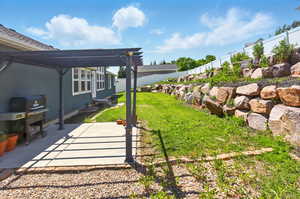 View of yard with a patio