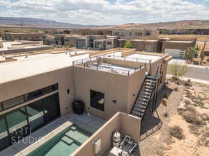 Exterior space with a mountain view and a patio area