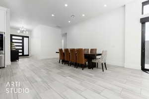 Dining space featuring an inviting chandelier