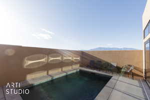 View of pool featuring a mountain view