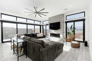 Living room featuring ceiling fan