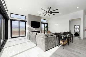 Living room featuring ceiling fan