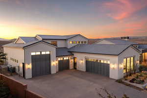 View of front of home featuring a garage