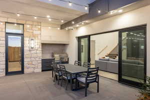 Dining space with a high ceiling