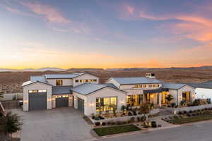 Modern farmhouse style home featuring a mountain view and a garage