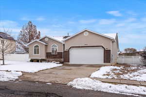 Ranch-style home with a garage