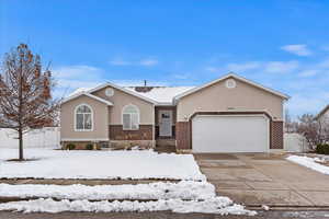 Ranch-style house featuring a garage