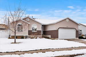 Ranch-style home with a garage