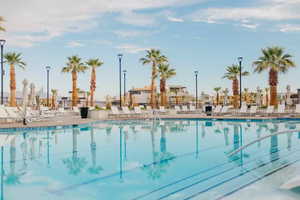 View of swimming pool with a patio area