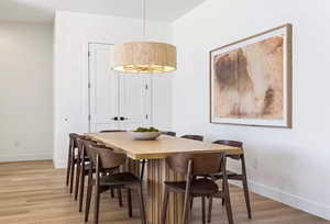 Dining area featuring light wood-type flooring