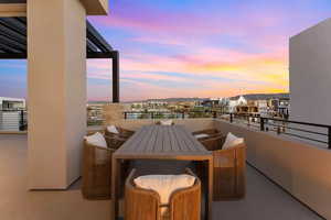 View of balcony at dusk