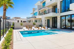 View of pool with a patio area