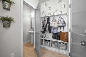 Mudroom featuring hardwood / wood-style floors