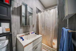 Bathroom featuring vanity and walk in shower