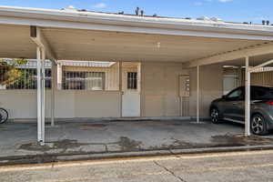 View of car parking with a carport