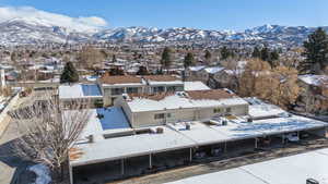 Snowy aerial view with a mountain view