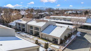 Snowy aerial view with a mountain view