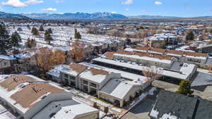 Snowy aerial view with a mountain view