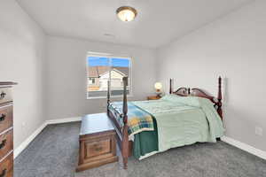 Bedroom featuring carpet floors