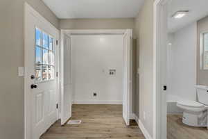 Interior space with light hardwood / wood-style flooring